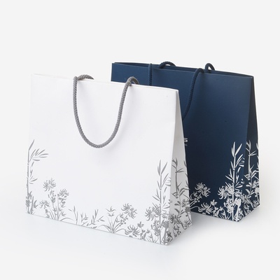 Good price Custom Matt Glossy Laminated White Art Paper Gift Bag With Handles For Shopping online